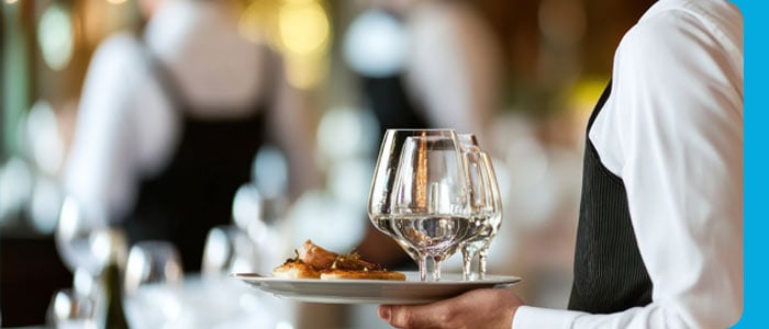Hospitality intern at restaurant