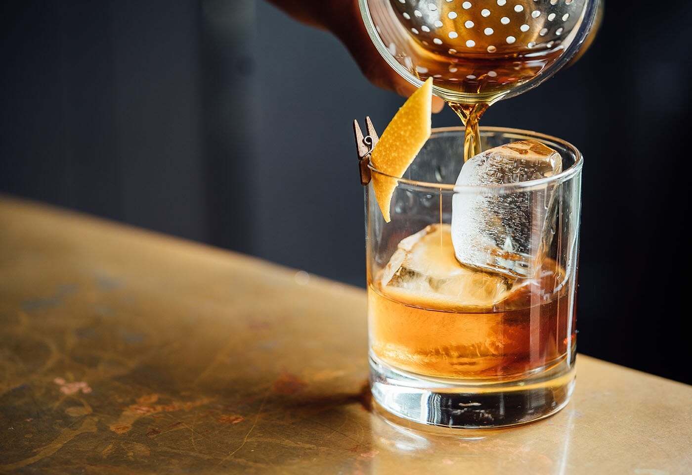 Cocktail with orange peel twist